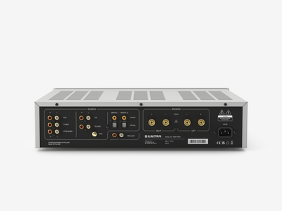 Back view of the Unitra DSH-605 silver audio amplifier on a white background
