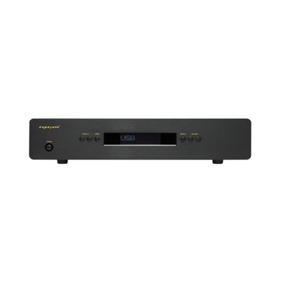 A black Exposure DAC with a front display showing 'USB' and several control buttons, photographed against a plain white background.