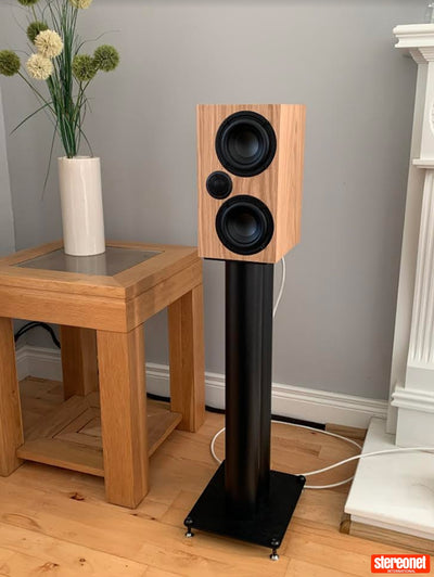 A brown Ophidian Mojo 2 bookshelf speaker with a black tweeter and a large black woofer.