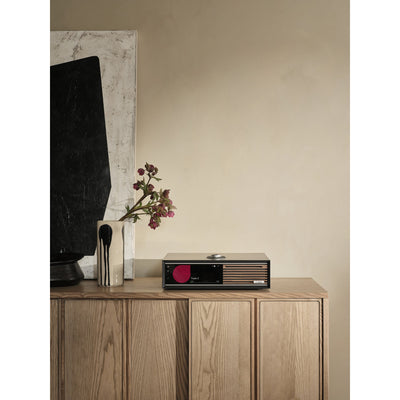 Ruark R710 in a living room with Talisman-R floorstanding speakers