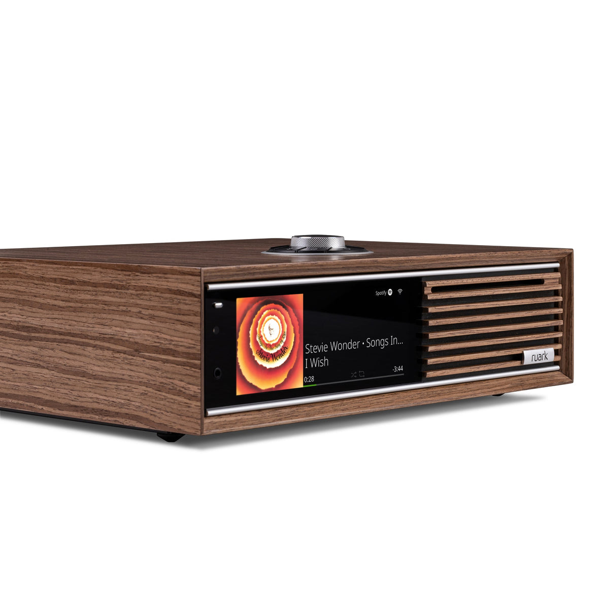 Ruark R710 in Fused Walnut, low front angle showing walnut slats and display
