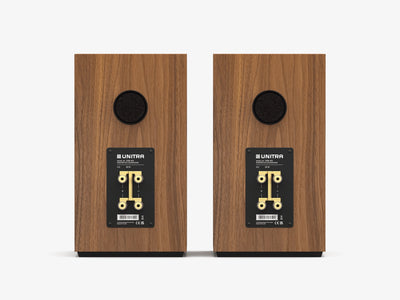 Unitra ZGB-401 bookshelf speakers in walnut on a white background