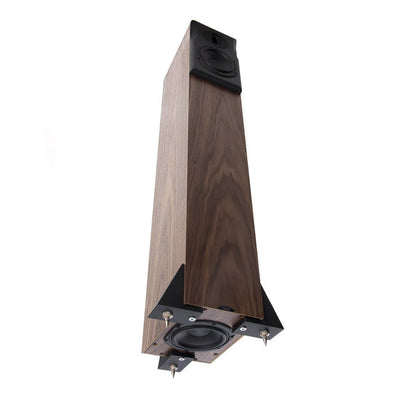 Neat Ekstra floor-standing tower speakers with a wooden finish, featuring a black front grille and a slim design.