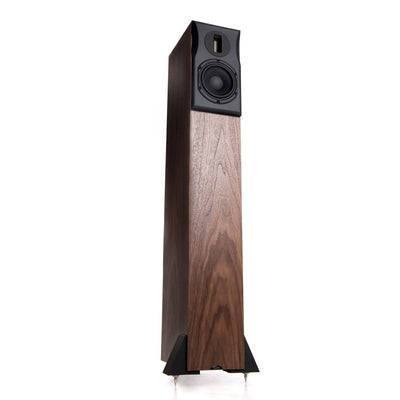 Neat Ekstra floor-standing tower speakers with a wooden finish, featuring a black front grille and a slim design.